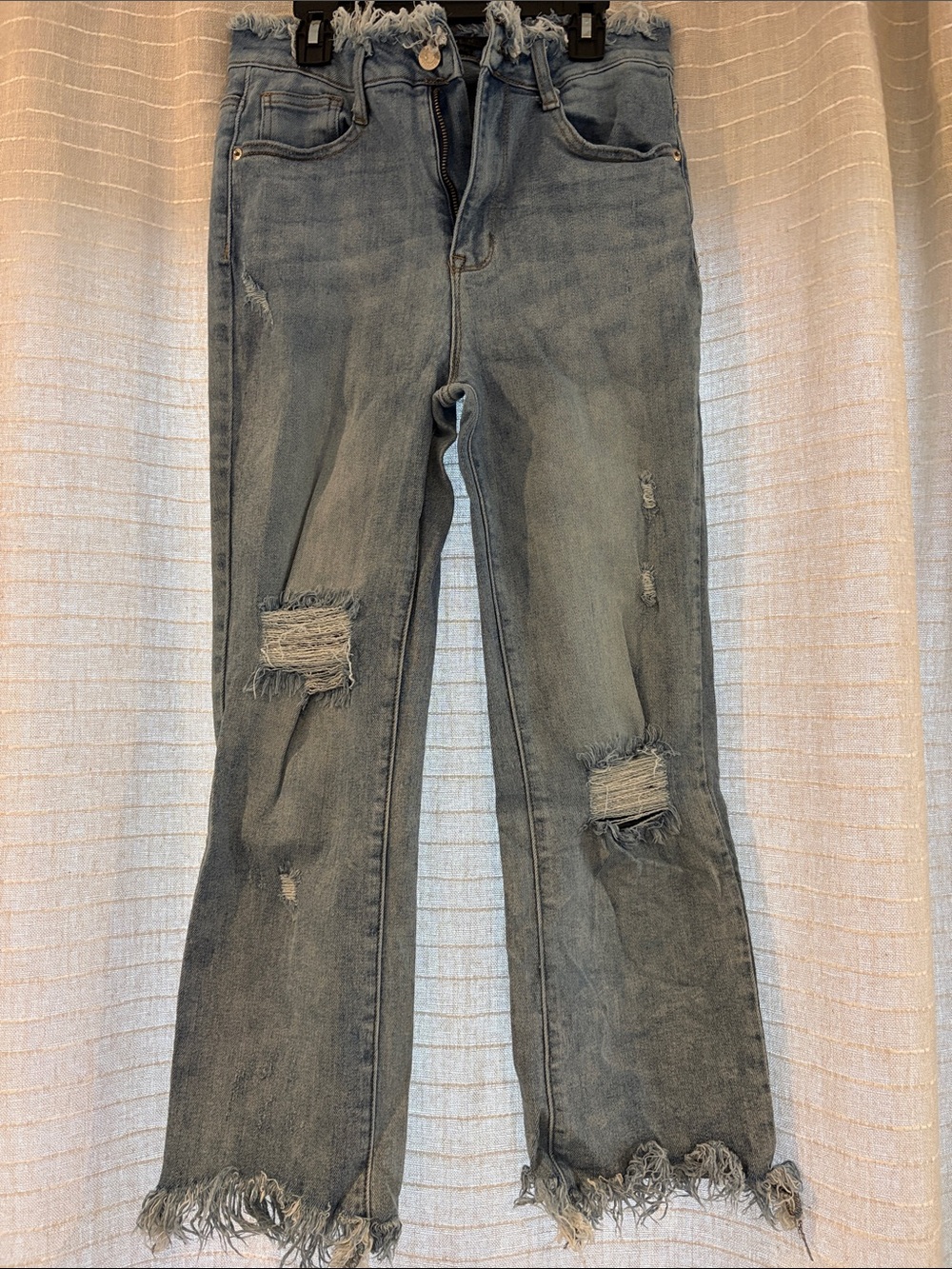 Risen High-Rise Distressed Women's Blue Jeans- frayed waist and flare